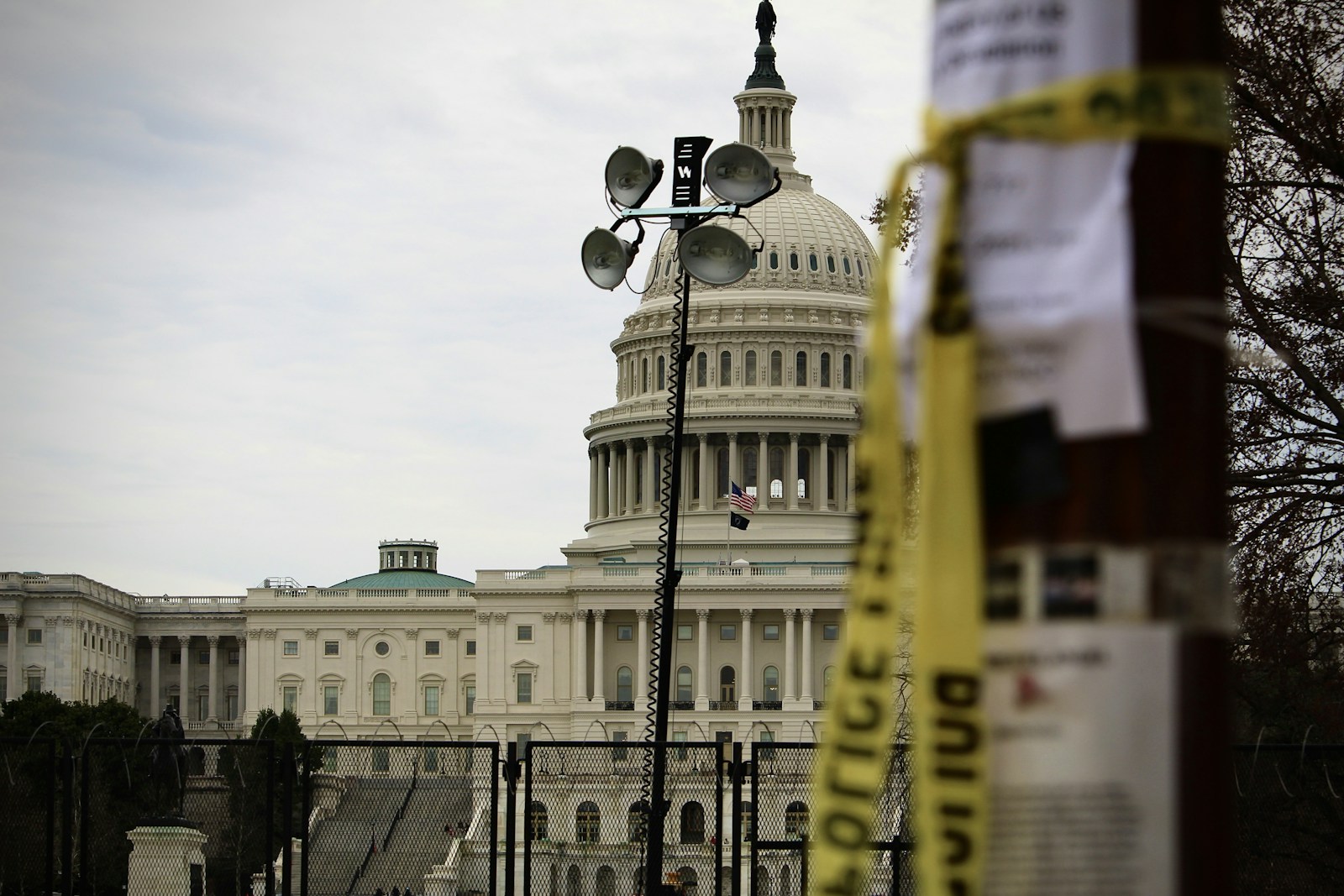 the capitol building with a measuring tape in front of it