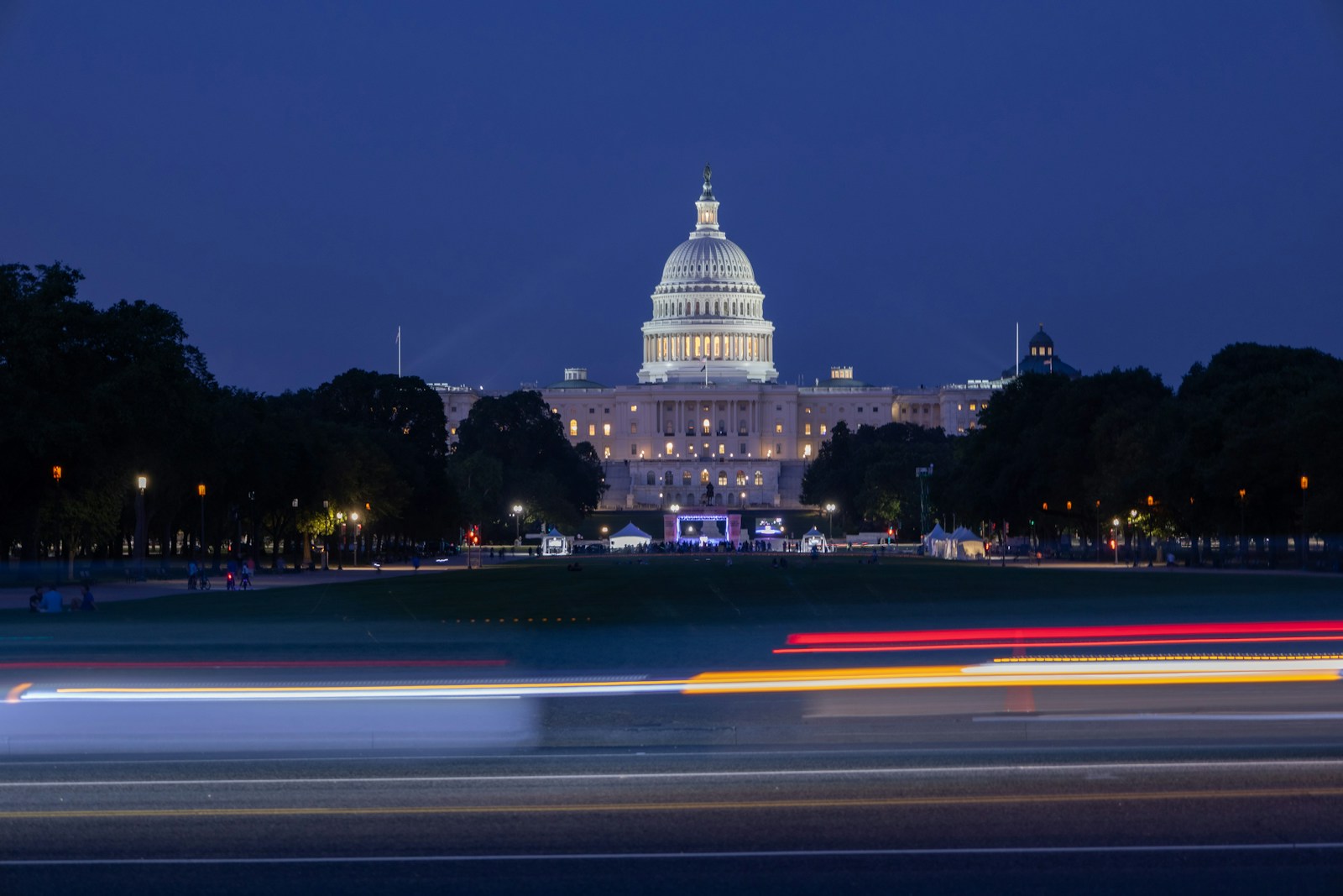 United states capitol building at night with light trails